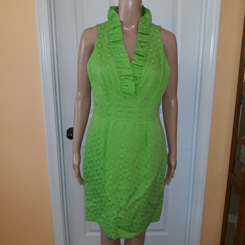 Green sleeveless sheath dress